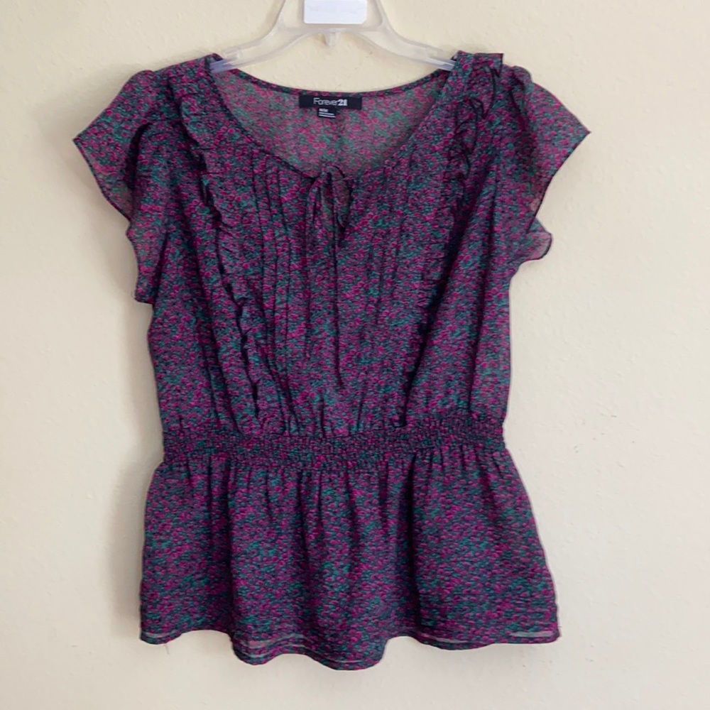 Forever 21 size M sleeveless blouse.